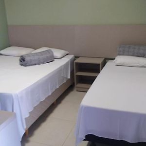 Quarto executivo para três pessoas